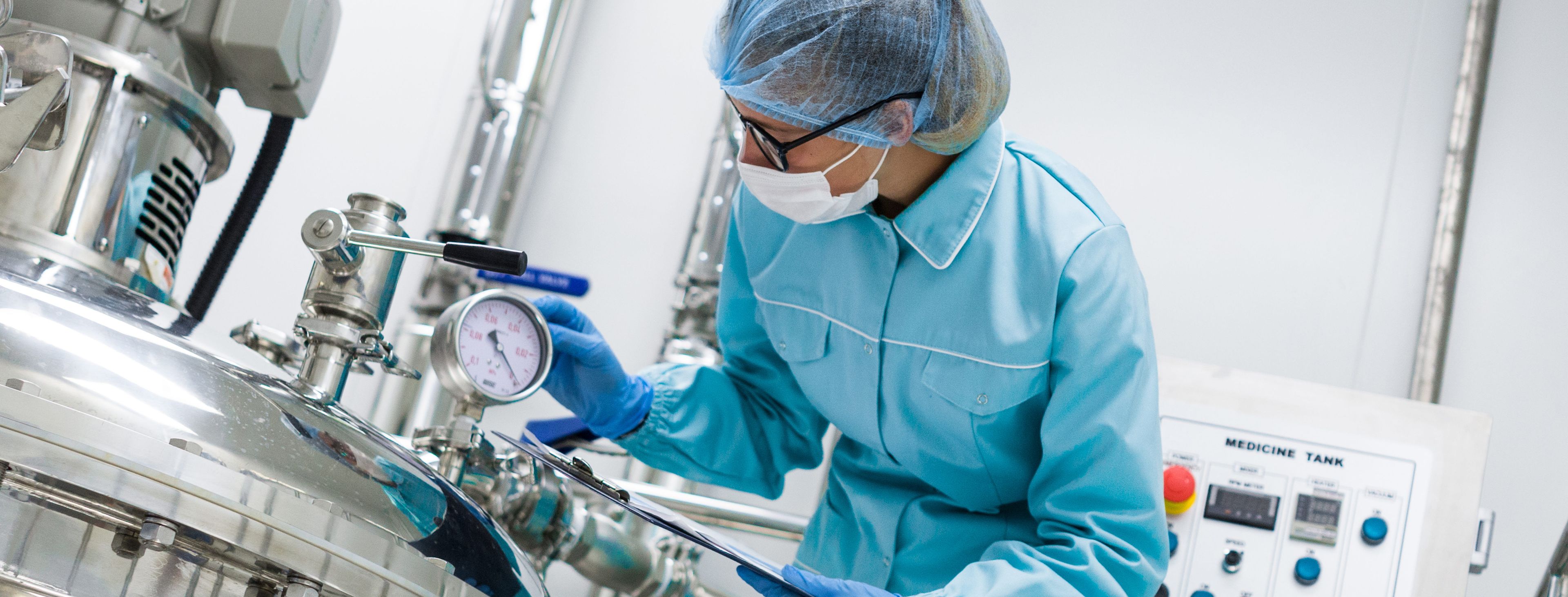 Person looking at a presssure valve