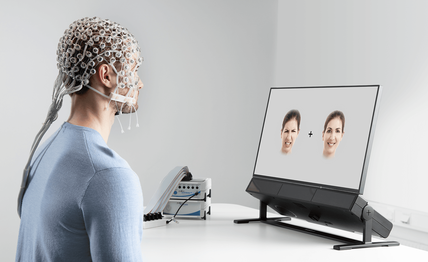 A person using Tobii Pro Spectrum and Brain Products to study emotions