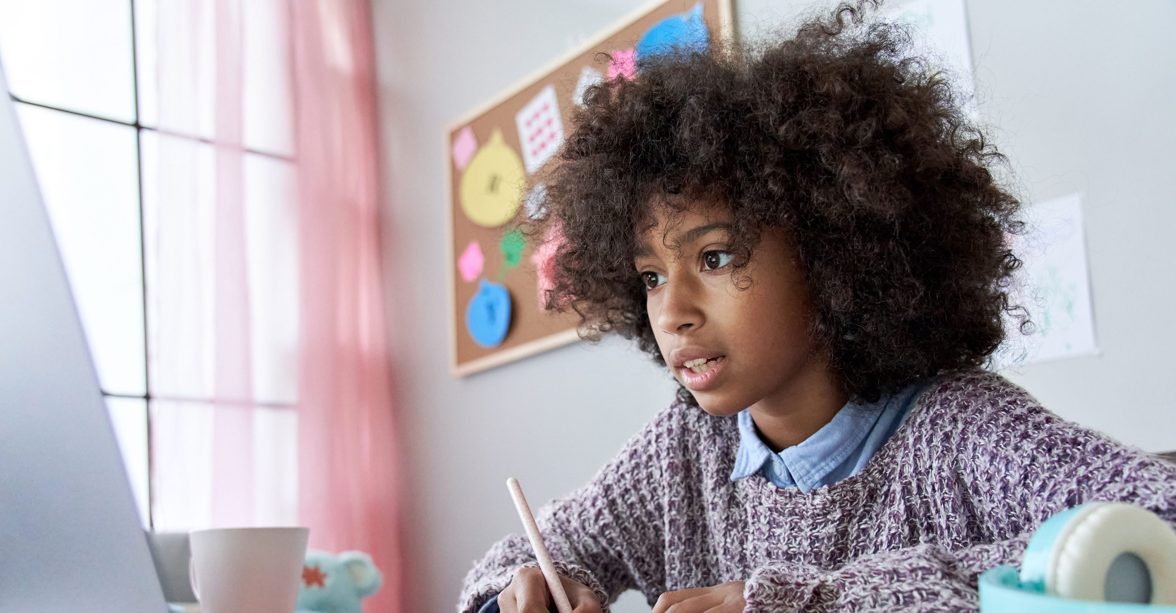 Girl doing online schooling