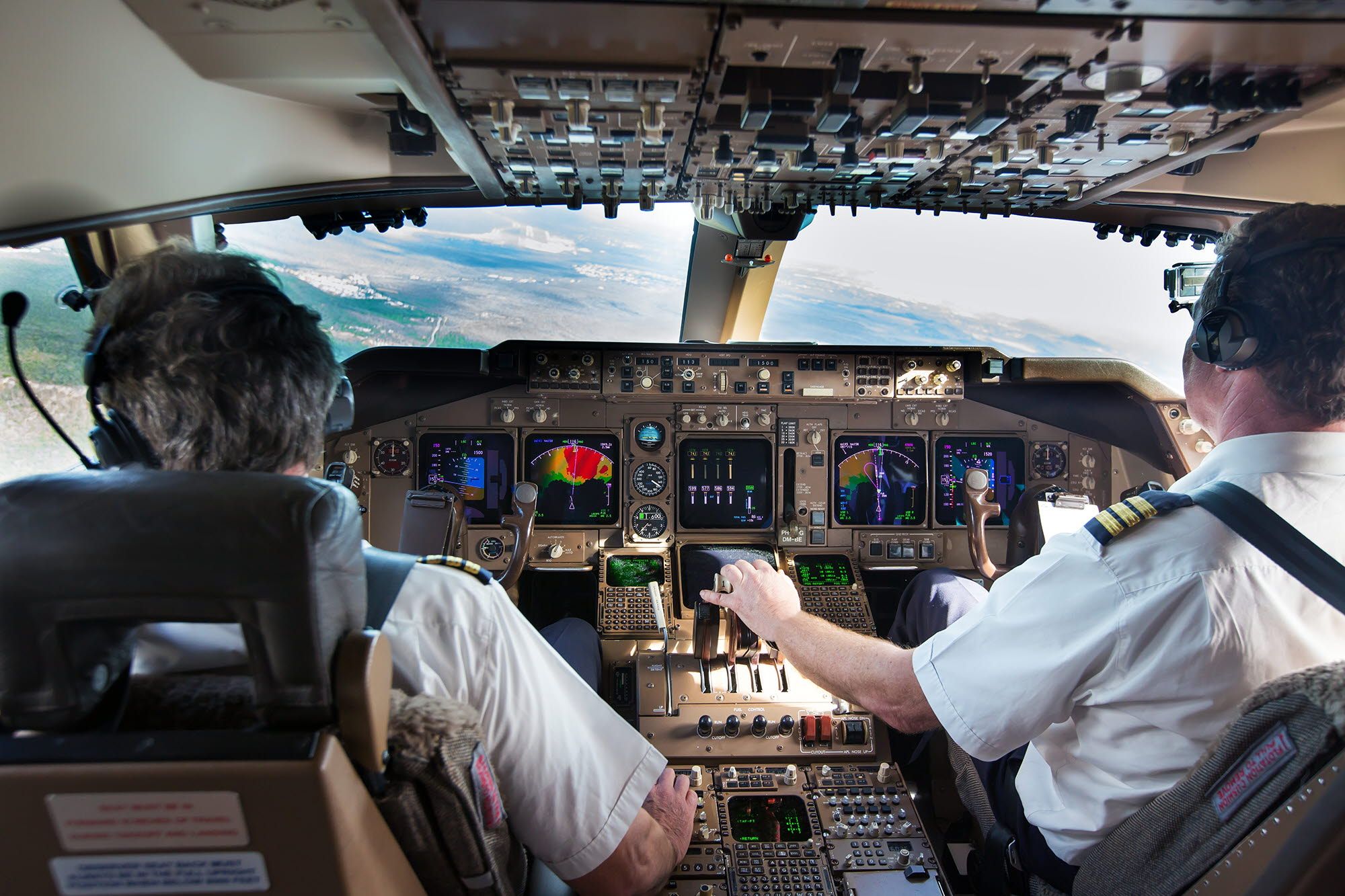 2 pilots in a cockpit
