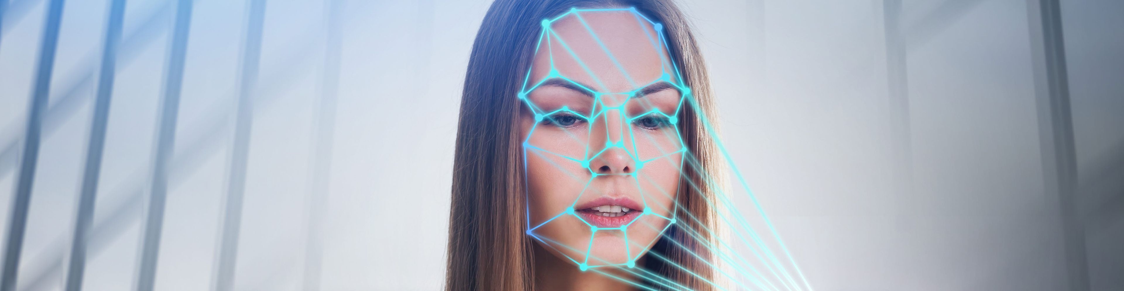 Woman looking at a computer emotion recognition