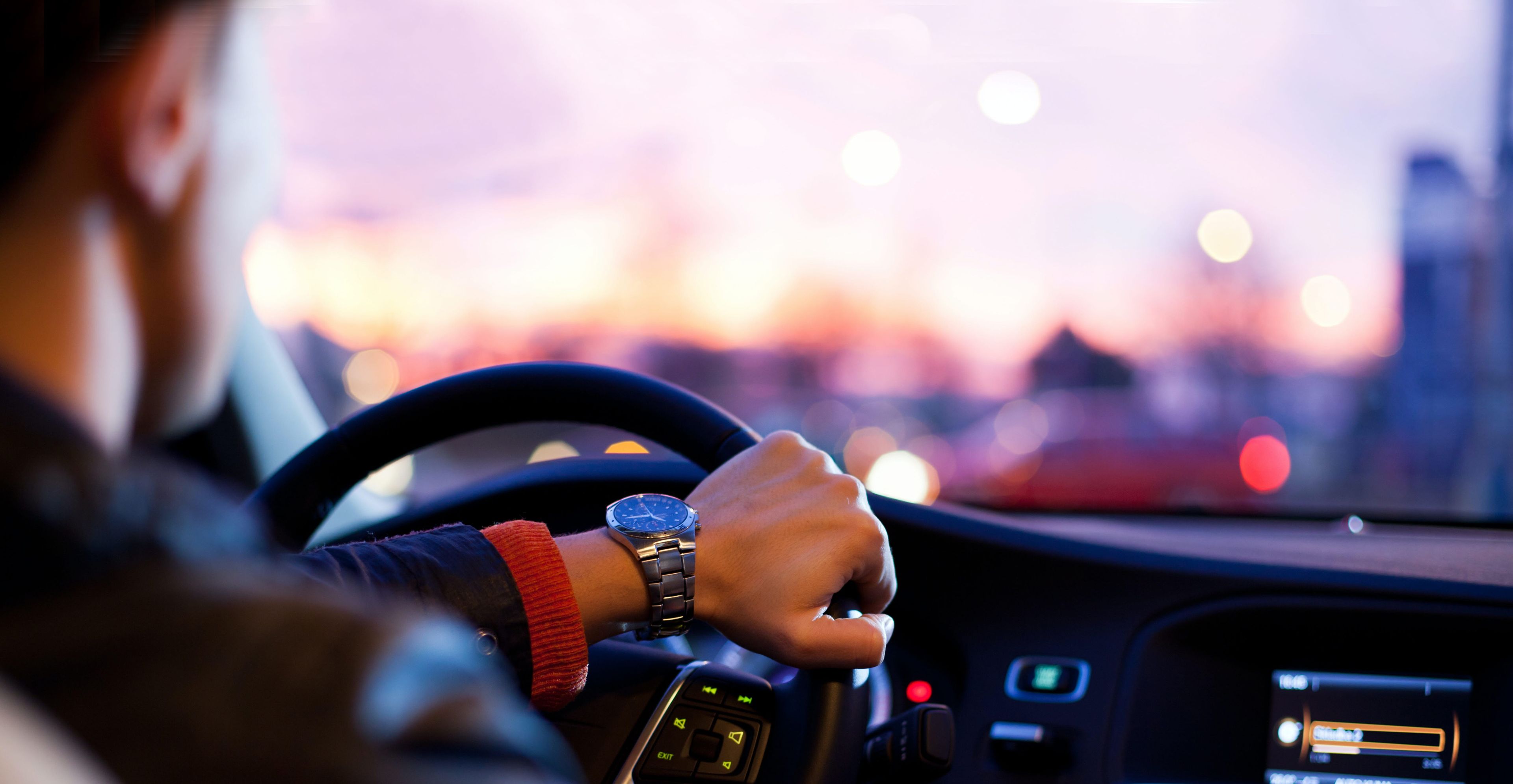 Person driving a car