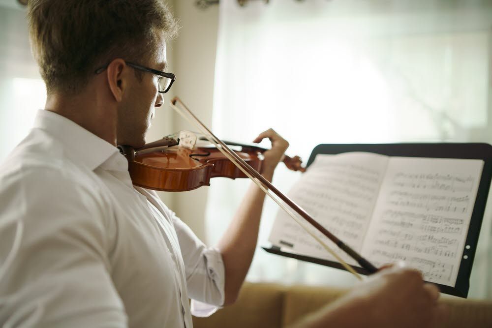 Man playing violin.