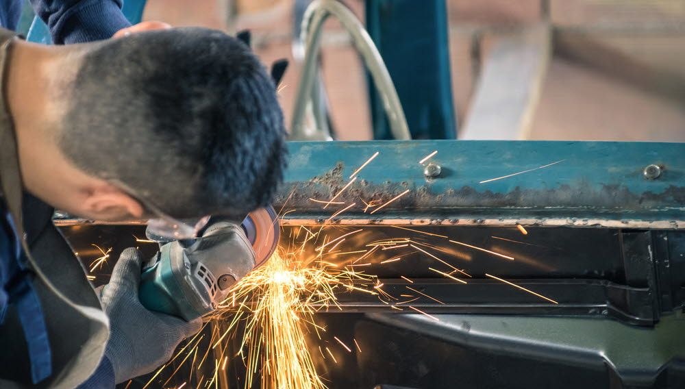 A man is working at factory