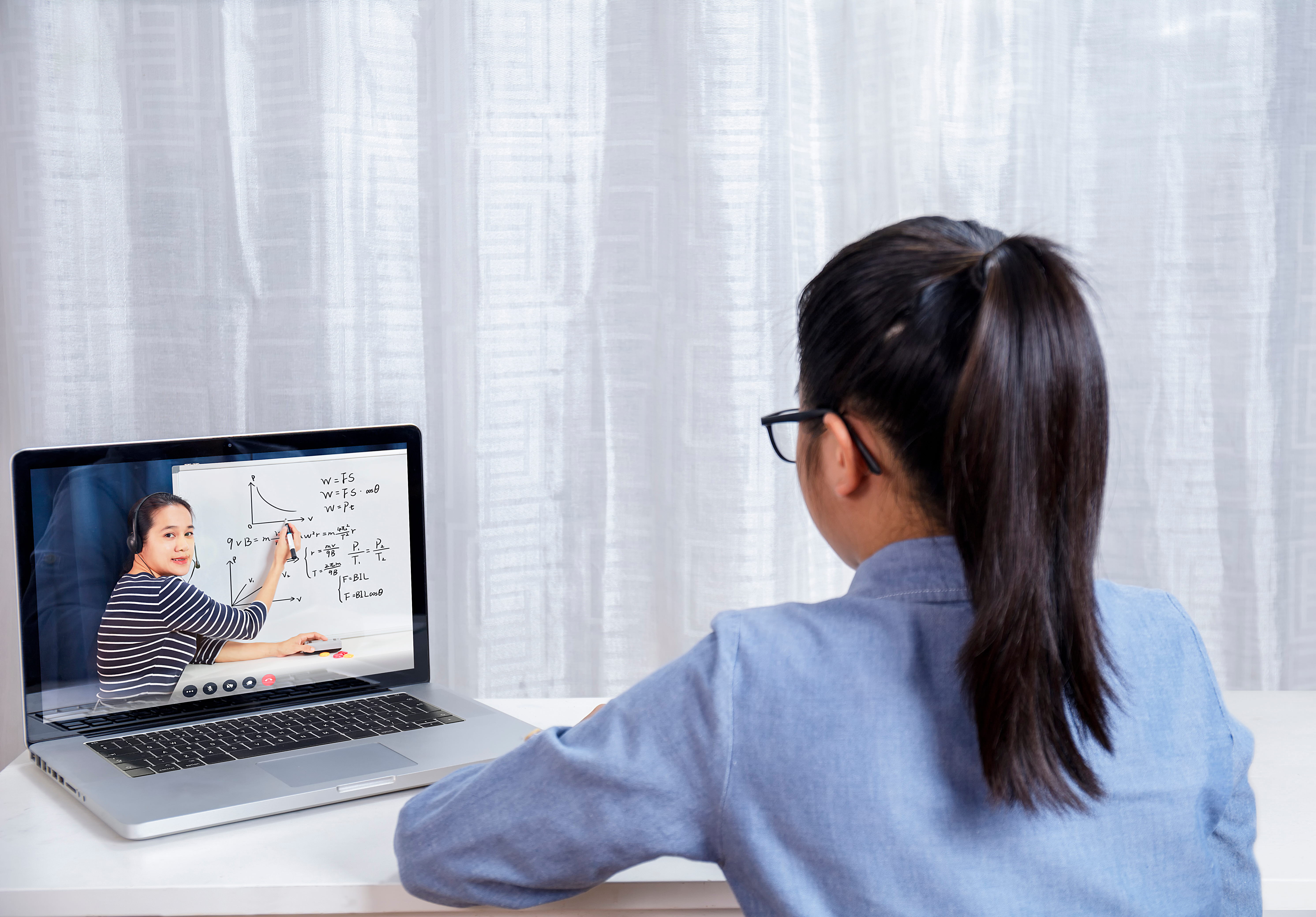 Little girl learning online
