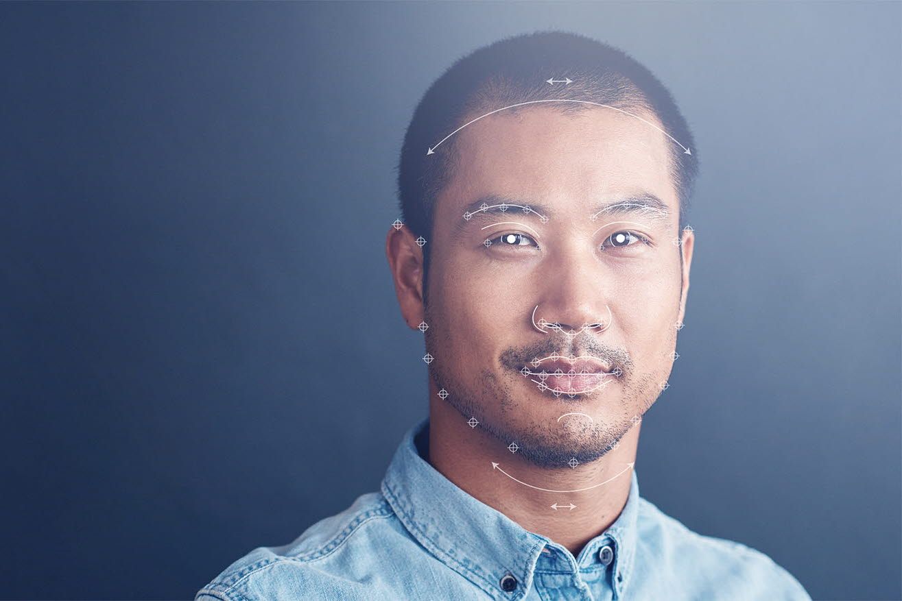 man with facial markers