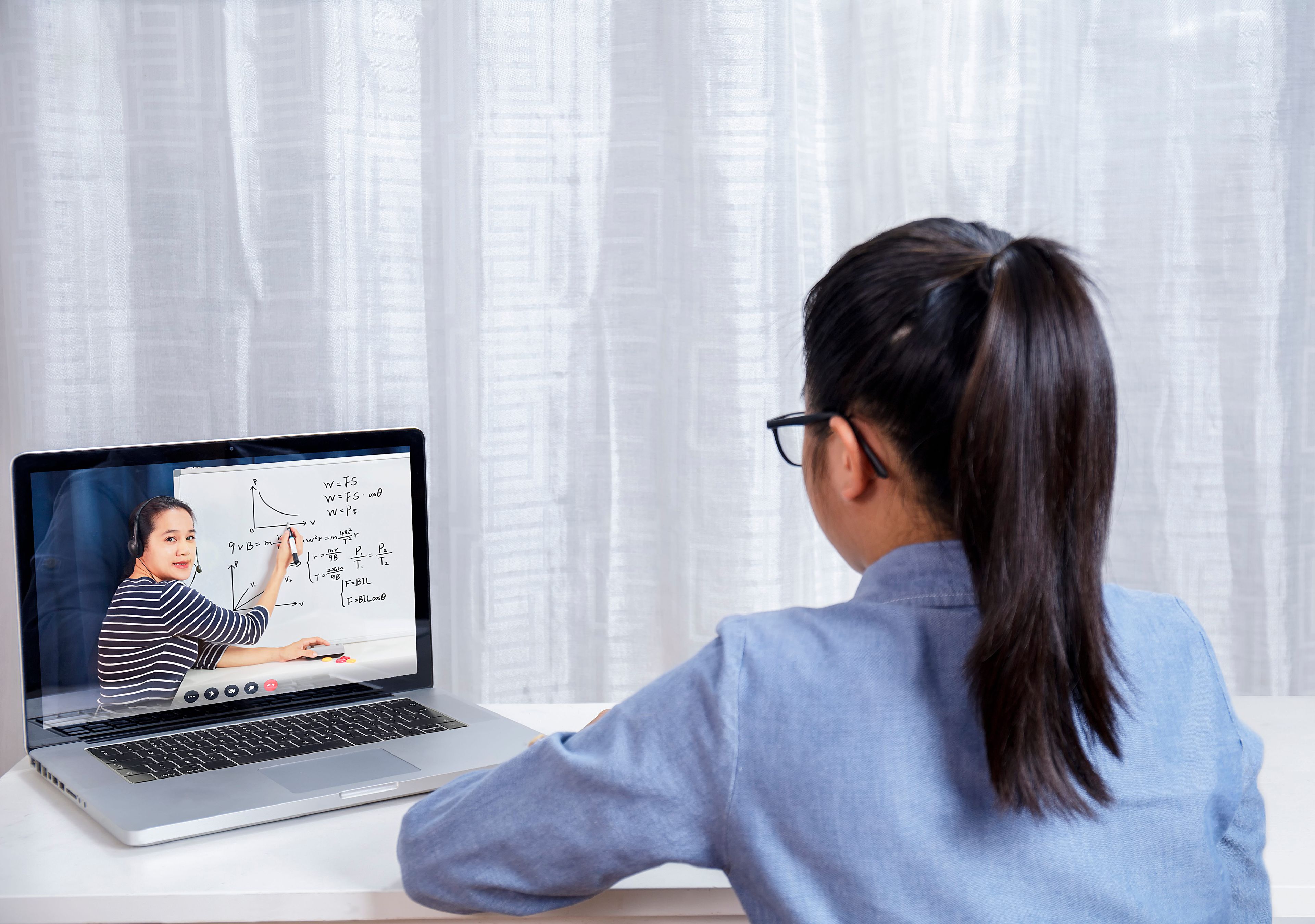 Little girl learning online