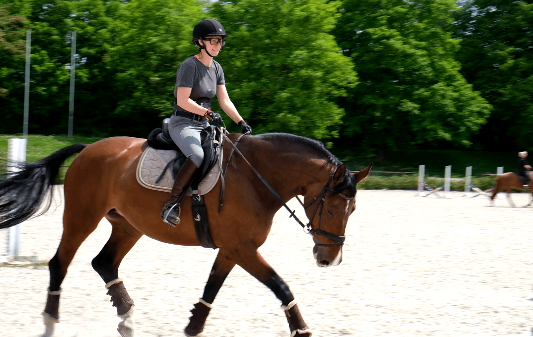 Person wearing Tobii Pro Glasses 3 while riding a horse