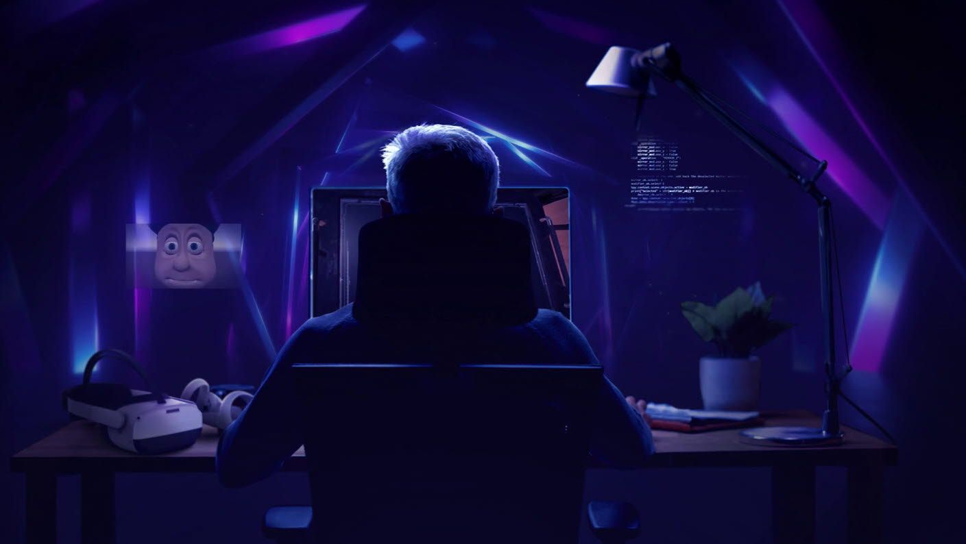 Man looking at computer screen while developing