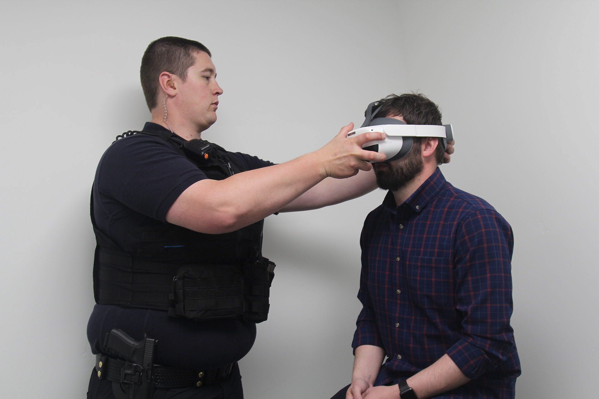 Police officer using VR headset to check for impairment