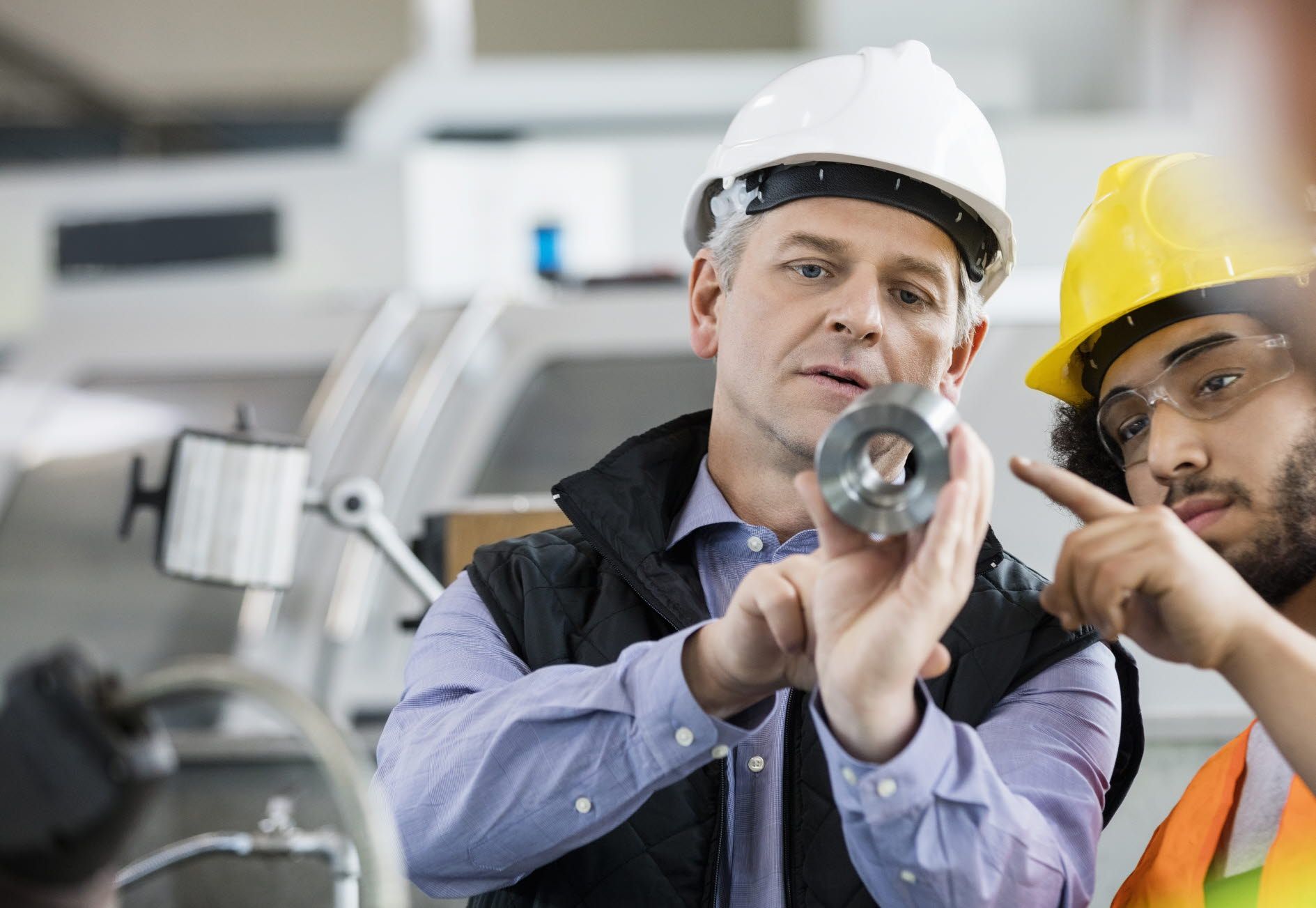 Senior staff training younger employee