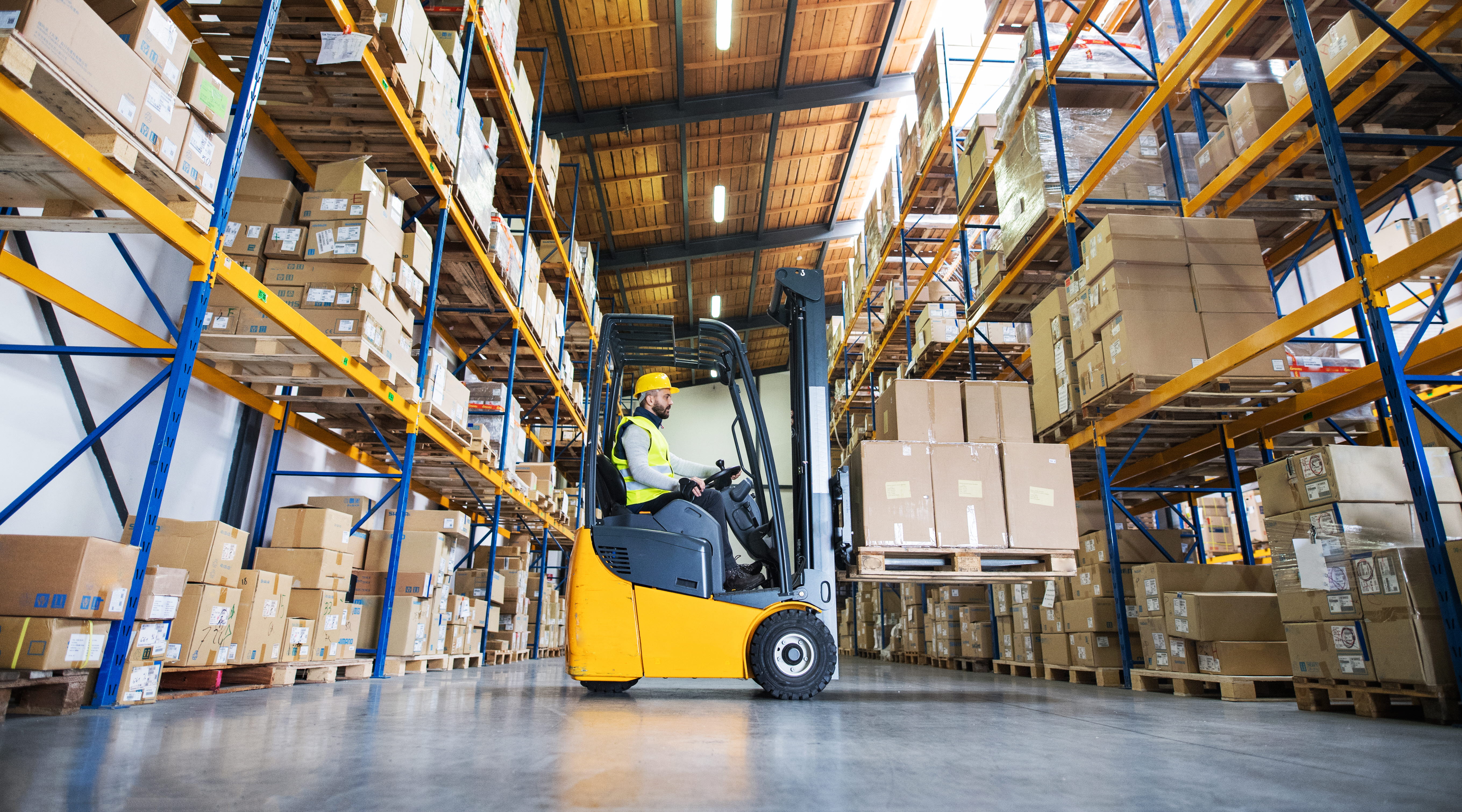 A forklift operator in a warehouse