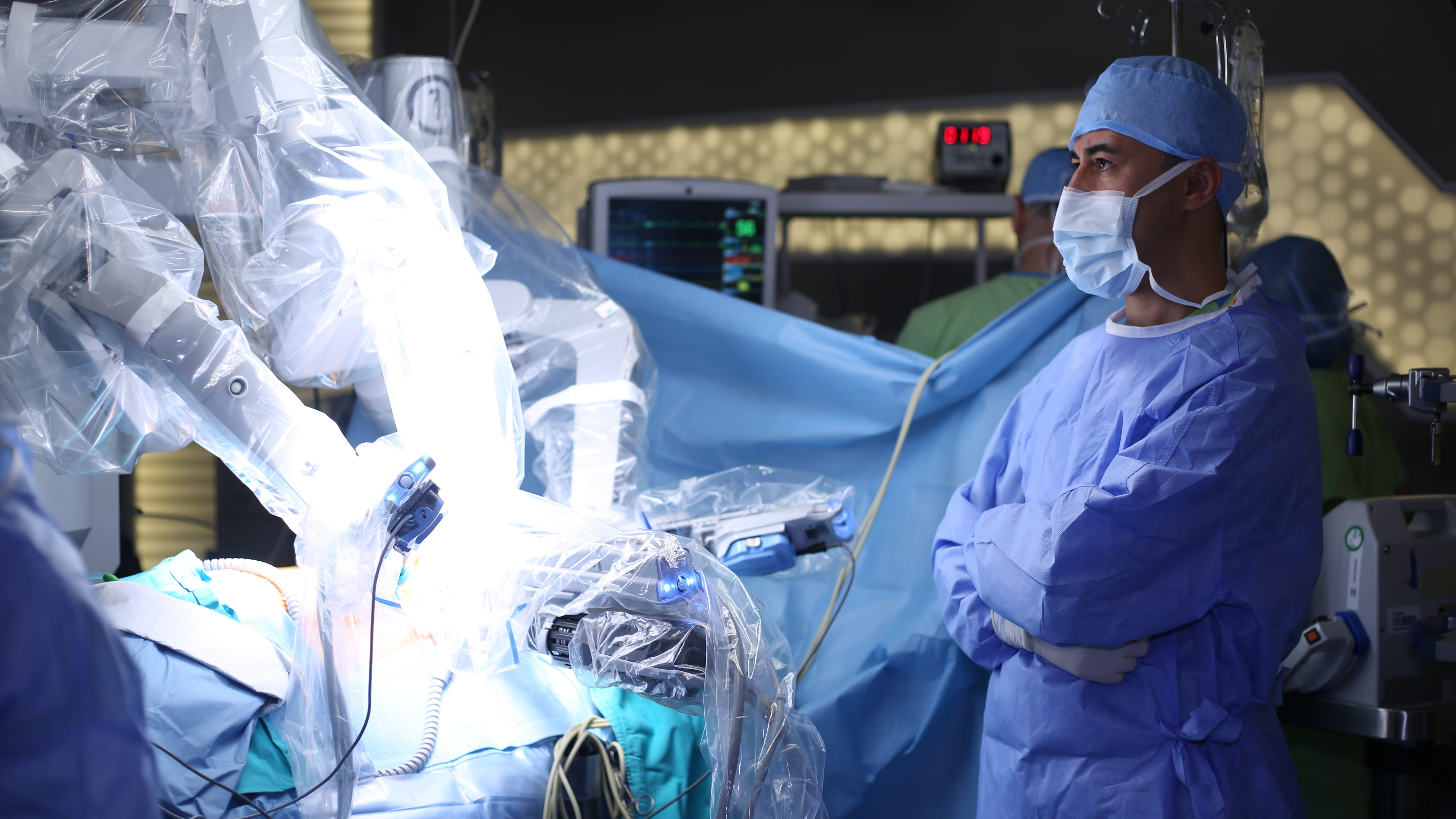 Surgeon working with surgical robotics