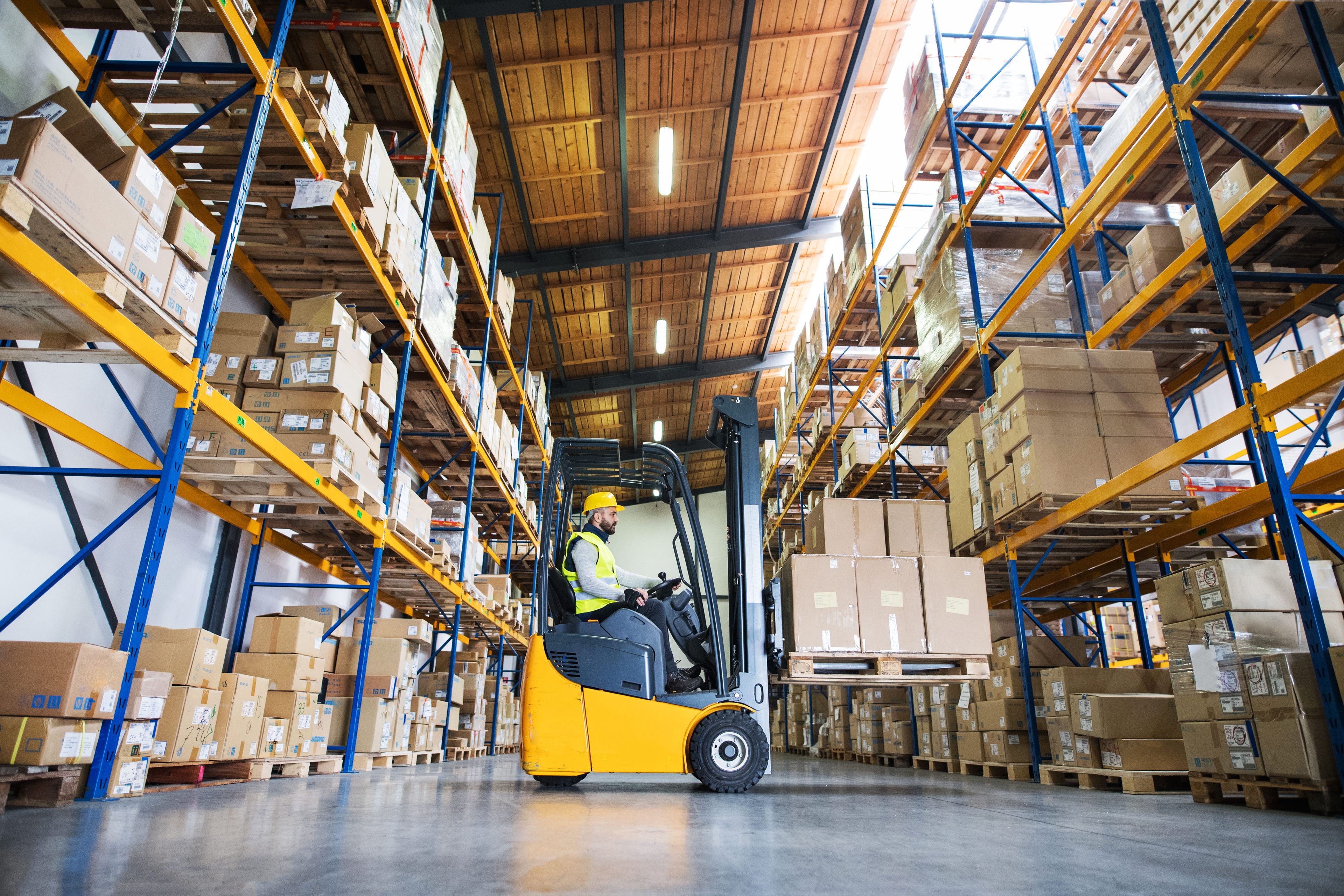 A forklift operator in a warehouse