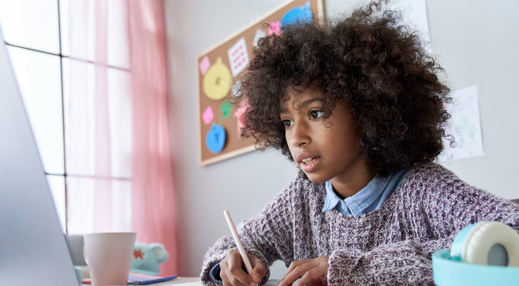 Girl doing online schooling