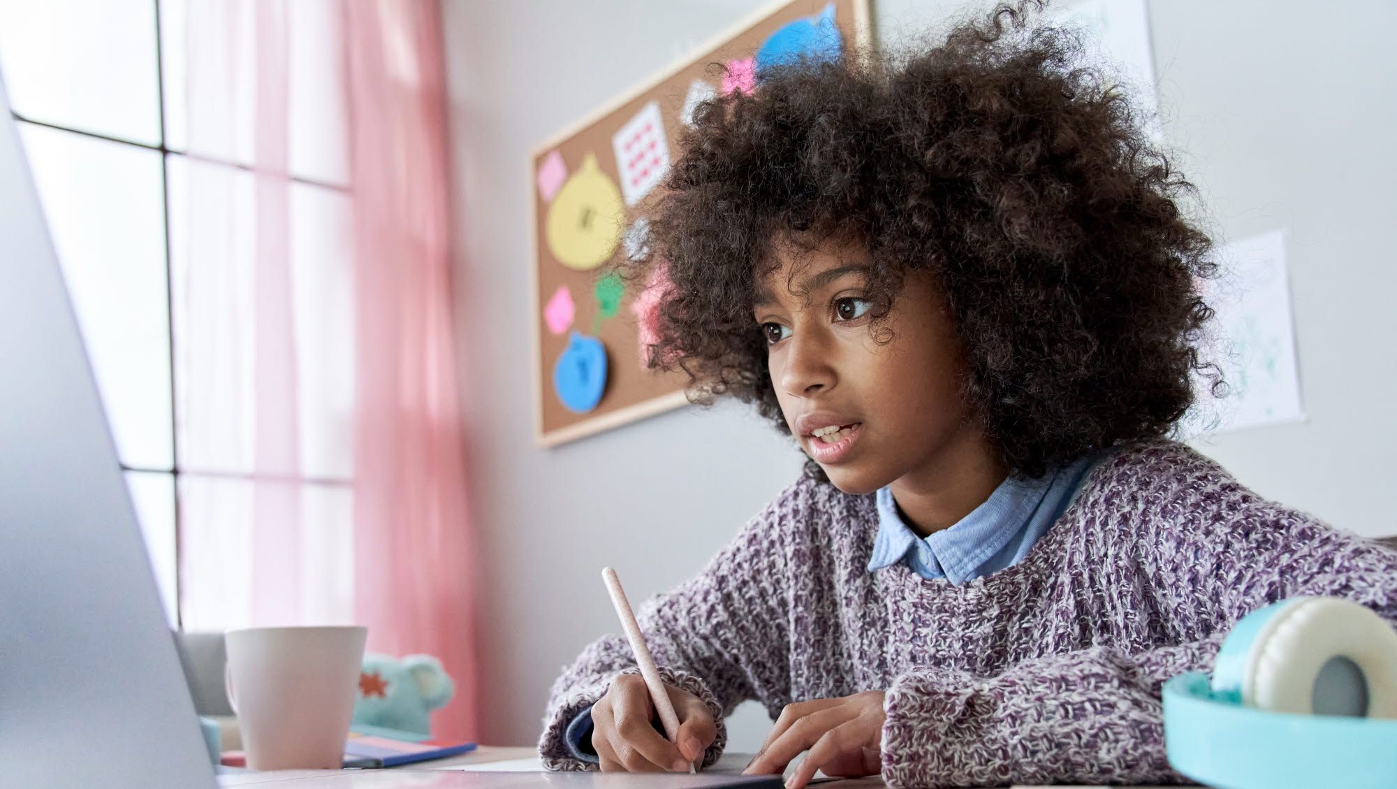 Girl doing online schooling